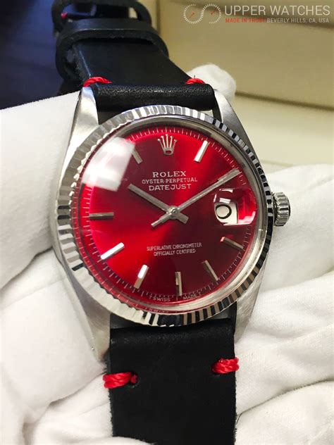 rolex watch with red dial